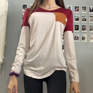 Red and white long sleeve shirt with tan patches